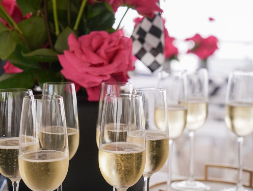 champagne table setting during Monaco grand prix yacht charter