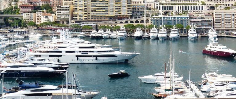 large mega yacht in harbor, largest mega yachts for sale in 2023