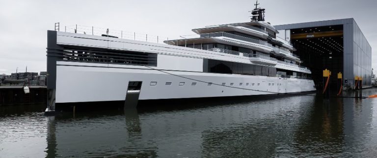 Dutch superyacht builder Feadship released images of 336ft (103m) Project 1011 leaving her construction shed at the team’s Makkum facilities.