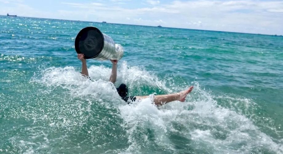 Florida Panthers alternate captain Matthew Tkachuk takes the Cup for a swim on June 25, 2024.