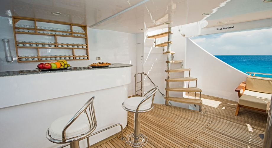 An indoor yacht deck of a luxury yacht sailing in the ocean. 