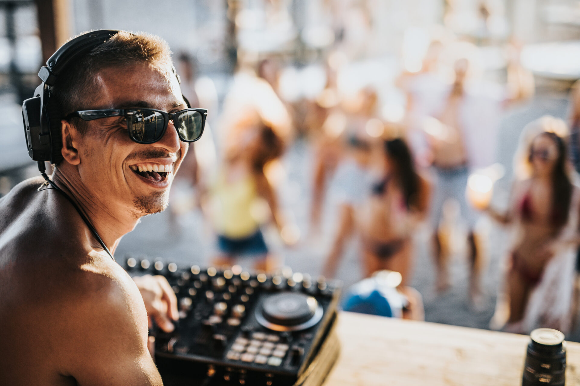 A dj playing music at a festival during Croatia island hopping Meets Festival Culture.