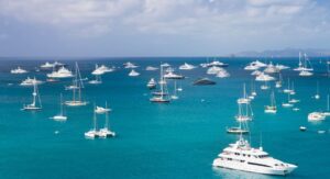Many yacht charters, sailing in the ocean. Explore the global yacht charter market expansion and how evolving trends are reshaping demand and destinations.