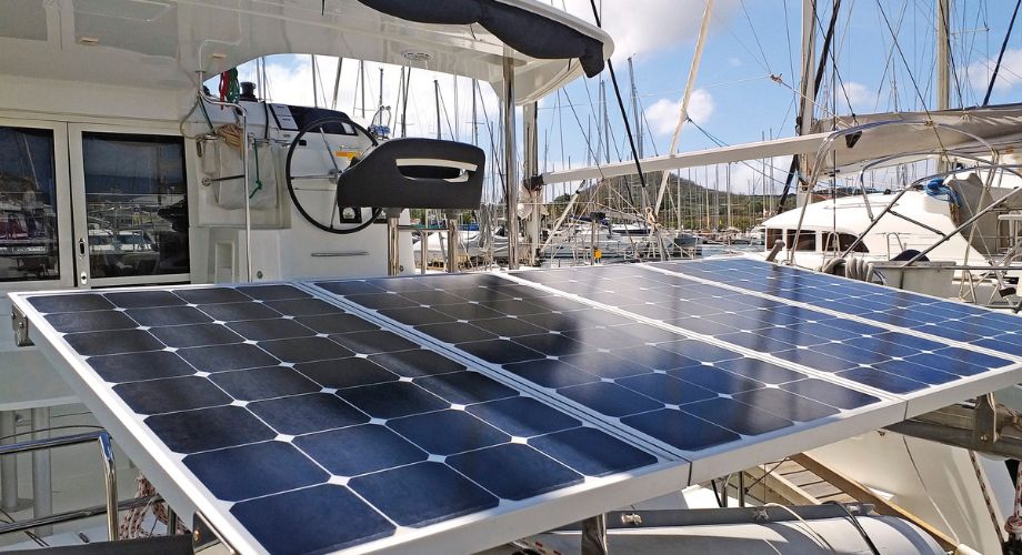 A solar yacht equipped with rooftop solar panels harnesses sunlight to generate clean energy for sustainable marine travel.
