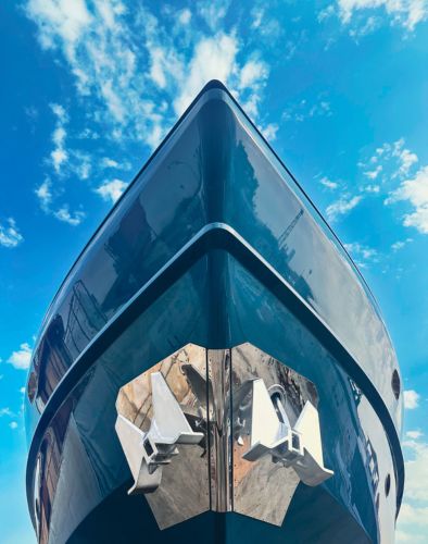 A yacht hull undergoing antifouling treatment. Explore the latest yacht antifouling technologies, from foul-release coatings to hydrodynamic systems used on superyachts.