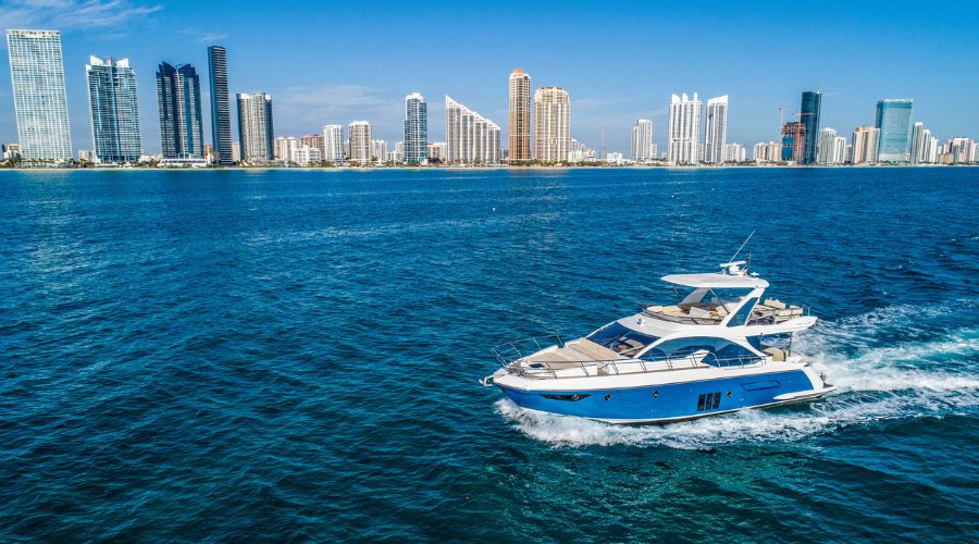 A luxury yacht sailing in the ocean. Explore the pros & cons of yacht mortgage vs. leasing. Compare yacht mortgage rates, leasing terms, and financing options to fit your budget.