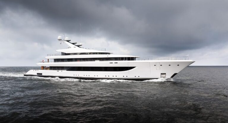 The 235ft luxury yacht STELLA M sailing on the ocean. Feadship delivers 235ft luxury yacht STELLA M, blending sleek design, diesel-electric propulsion, and ultimate Mediterranean comfort.