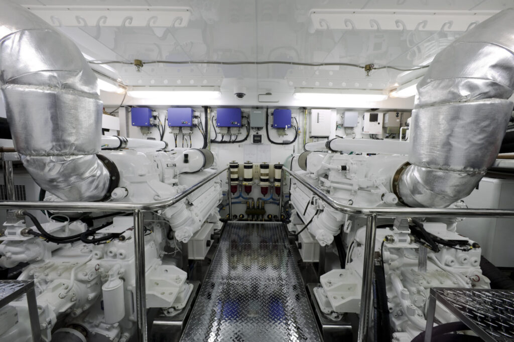 Yacht Engine | Guide to Types, Sizes, and Maintenance | YATCO Interior of yacht engine room.