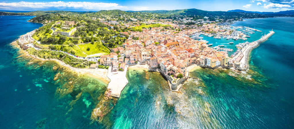 Cannes to St Tropez | French Riviera Yacht Charter | YATCO Saint Tropez village fortress and landscape aerial panoramic view.