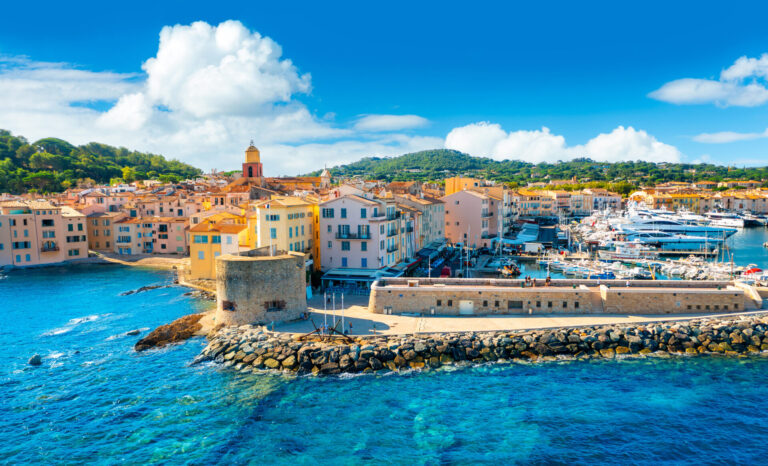 View of the city of Saint-Tropez in the sunset light, Provence.  Sail from Cannes to St Tropez in 48 hours. Experience luxury superyacht charters on the French Riviera and Mediterranean.