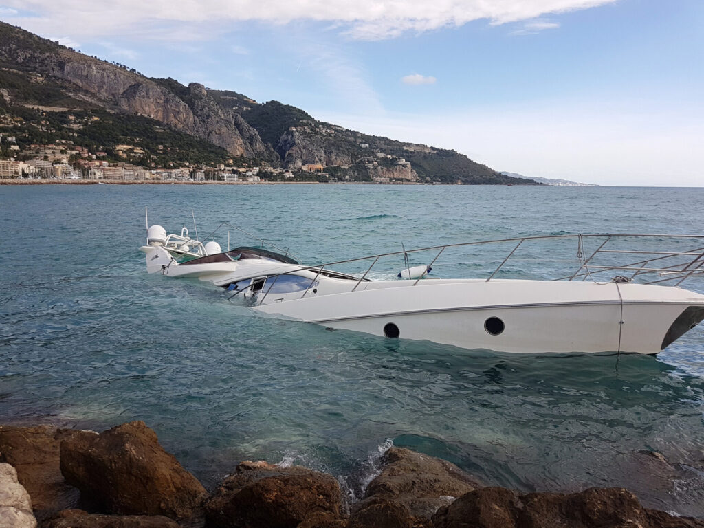 Maritime Accidents | How to Claim Compensation | YATCO Up View Of Luxury Yacht Half Sunken After Adrian Storm In The Mediterranean Sea.