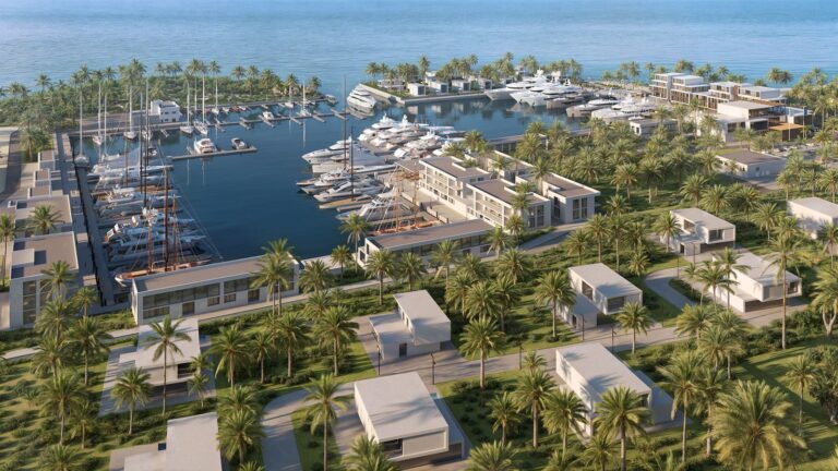 Luxury yachts docked in front of Port Nimara Anguilla. Discover Port Nimara, Anguilla’s transformative superyacht marina and lifestyle hub, driving economic growth and sustainable luxury.