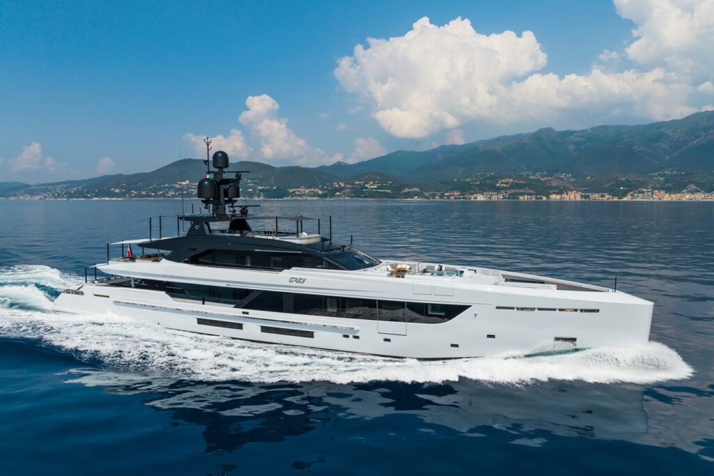 Yacht Entertainment Systems | Tech & Party Features | YATCO The GREY superyacht, equipped with yacht entertainment systems, is sailing on the ocean.