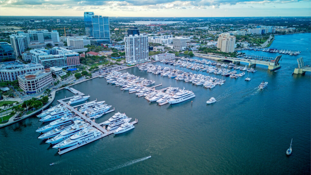 American Yacht Builders | Luxury Yachts to Buy in USA | YATCO Luxury yachts for sale are docked in West Palm Beach.