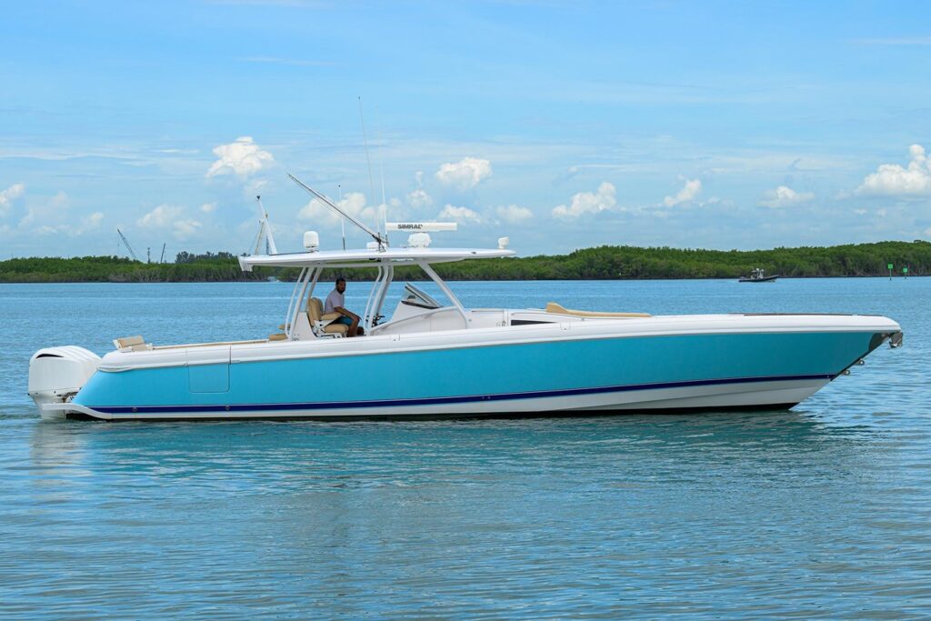 American Yacht Builders | Luxury Yachts to Buy in USA | YATCO The 47' Intrepid Powerboats is sailing on the ocean.