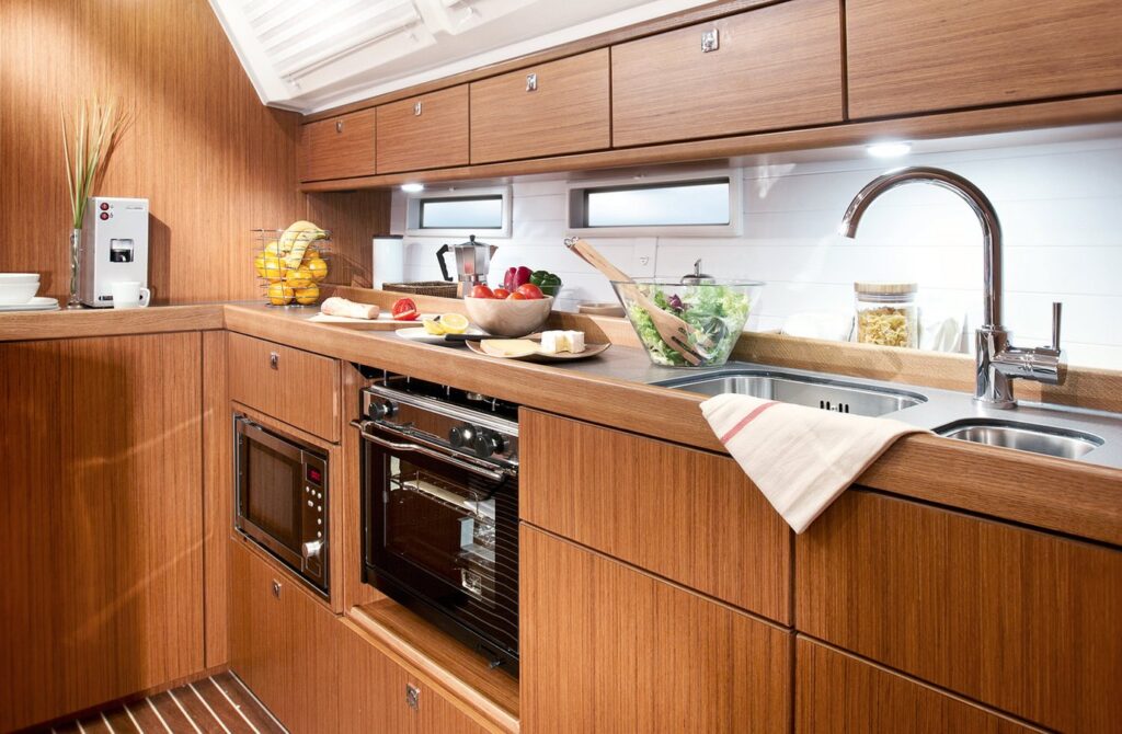 The interior kitchen of a Bavaria Cruiser 46 yacht.