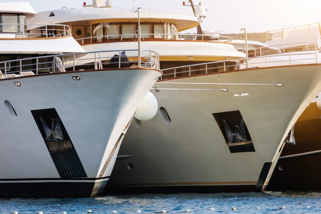 Luxury Yacht Market | Maintenance | Insurance | YATCO Two luxury yachts are docked on the ocean. Explore how the value of a yacht affects ongoing maintenance & insurance costs. Explore depreciation & insights into the luxury yacht market.