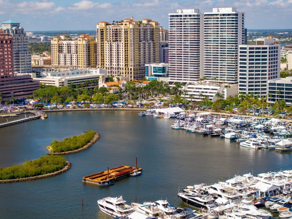 Luxury Yacht Market in Florida | Trends & Top Listings | YATCO Aerial drone photo Palm Beach International Boat Show showcasing the luxury yacht market in Florida.