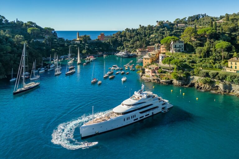 Luxury Cranchi yachts sailing on the ocean.