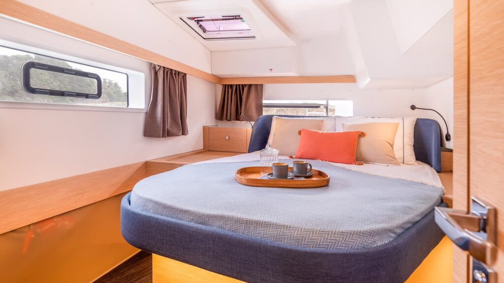 Fountaine Pajot Catamarans | Verified Listings & Specs | YATCO Interior bedroom of a vessel.