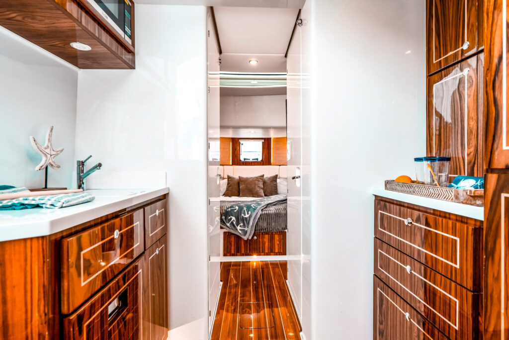 HCB Yachts Buying Guide | Luxury Center-Console Style | YATCO HCB yacht, Suenos GIX interior bedroom.