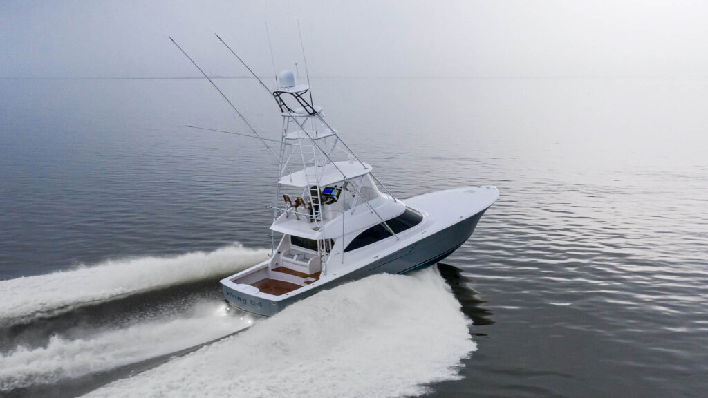 Viking Yachts | Verified Listings & Expert Buying Tips | YATCO A vessel is sailing on the ocean.